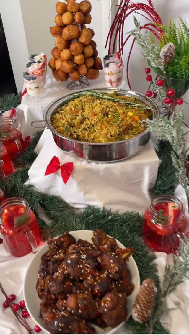Christmas catering setup with a tray of fried rice and peppered chicken