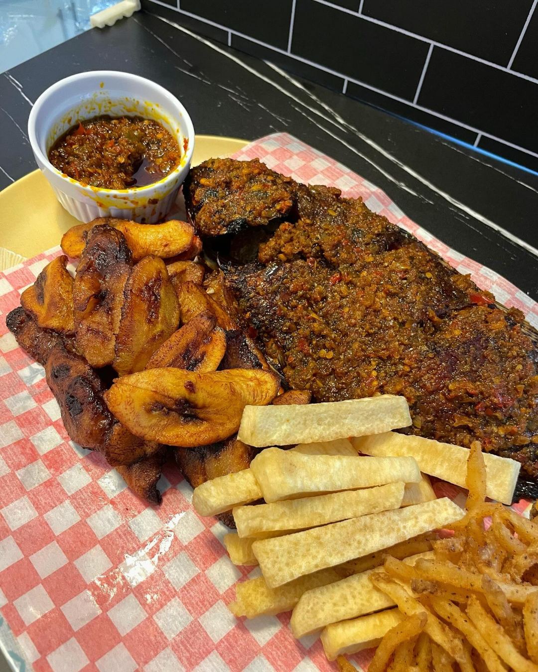 Suya with fried plantain and yam fries